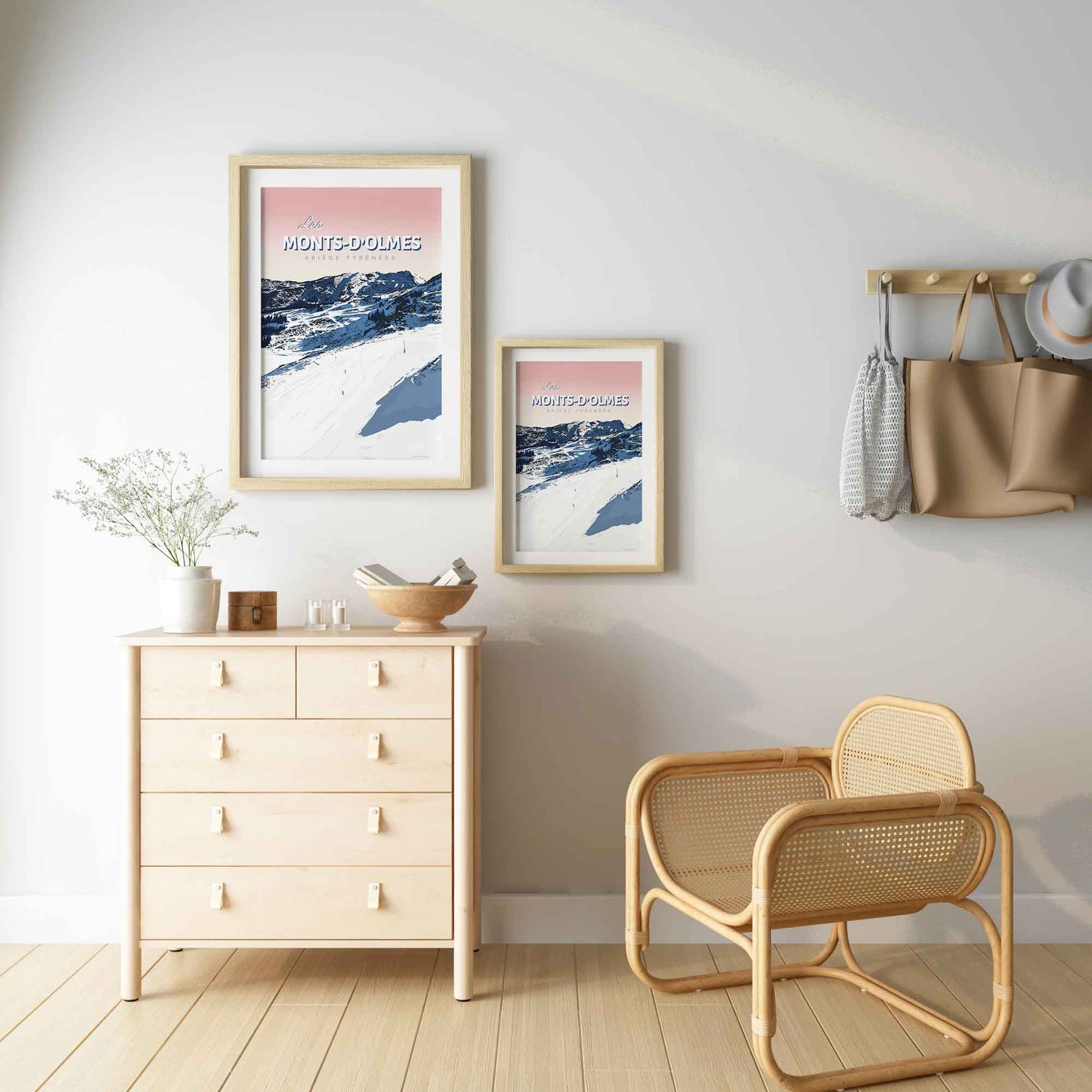 Mise en situation de deux affiches Goodbye Marylou (formats A2 et A3) accrochées au mur dans une décoration scandinave avec commode en bois et fauteuil en rotin.